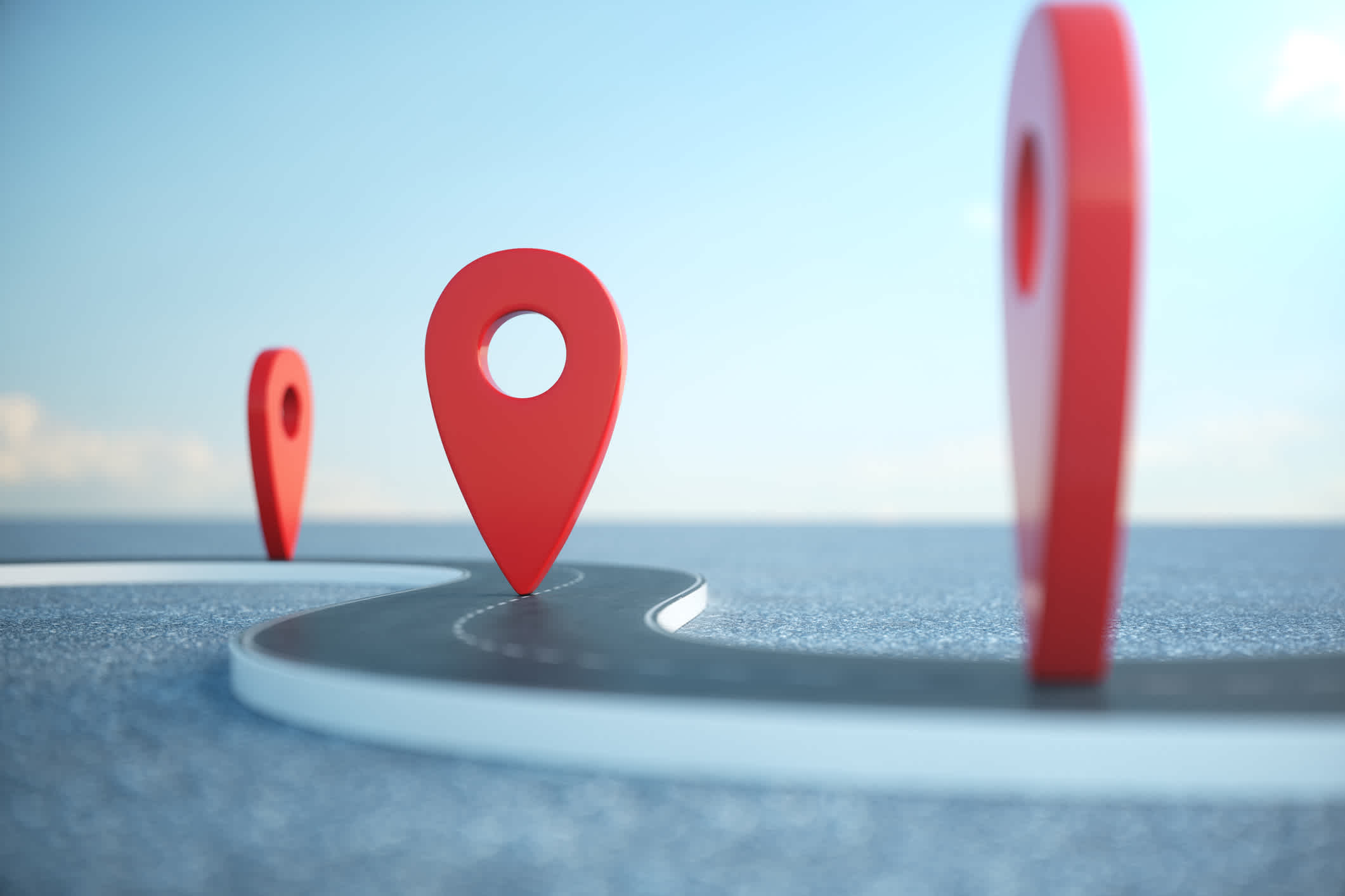 Image of location pins on a roadmap. | Watermark