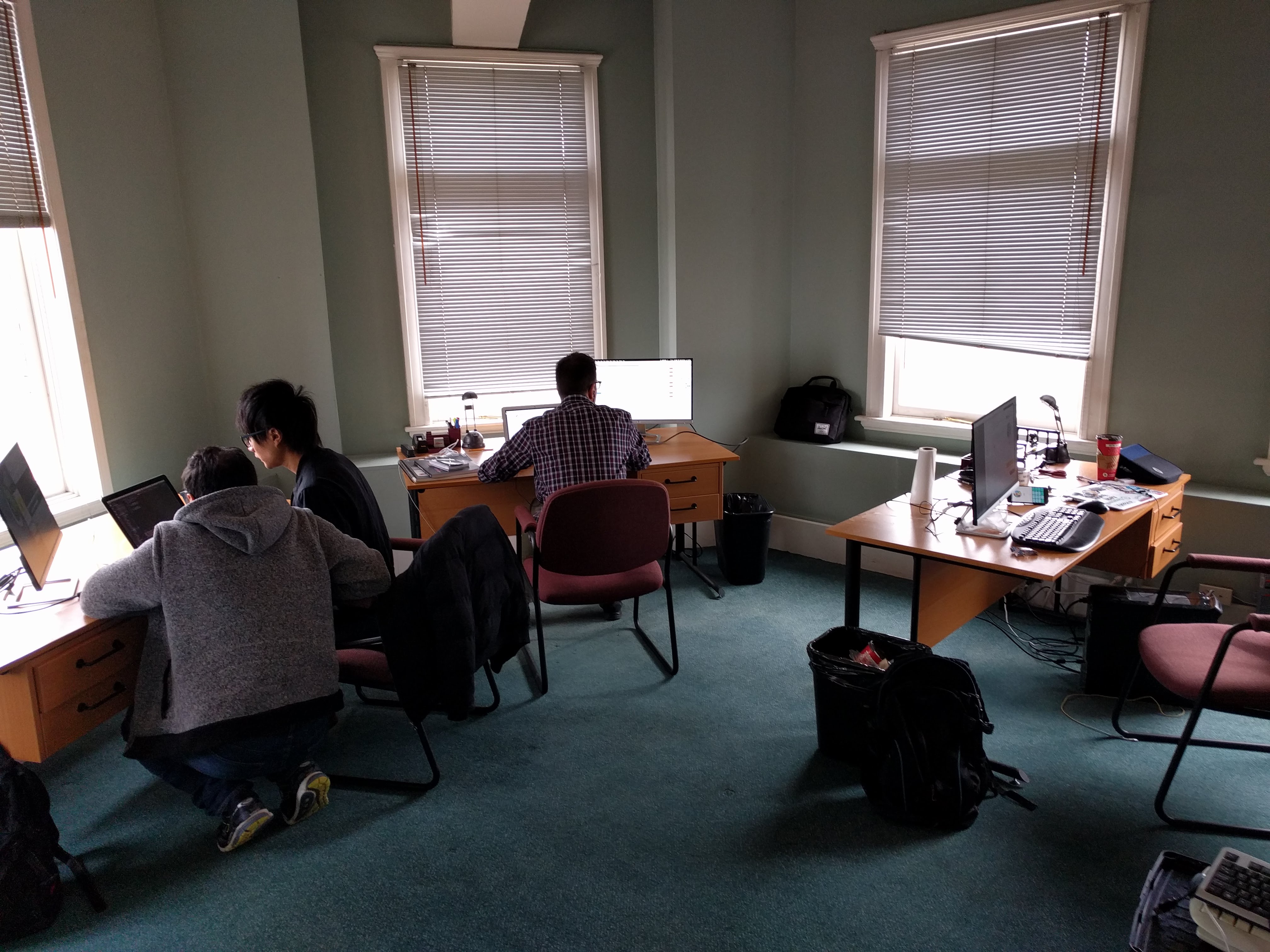 Convergence 2018 team working in new office