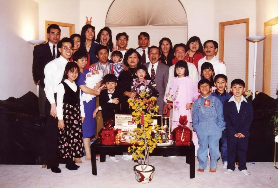 Jimmy and his family from 1996 (Jimmy in the striped shirt on the center left)