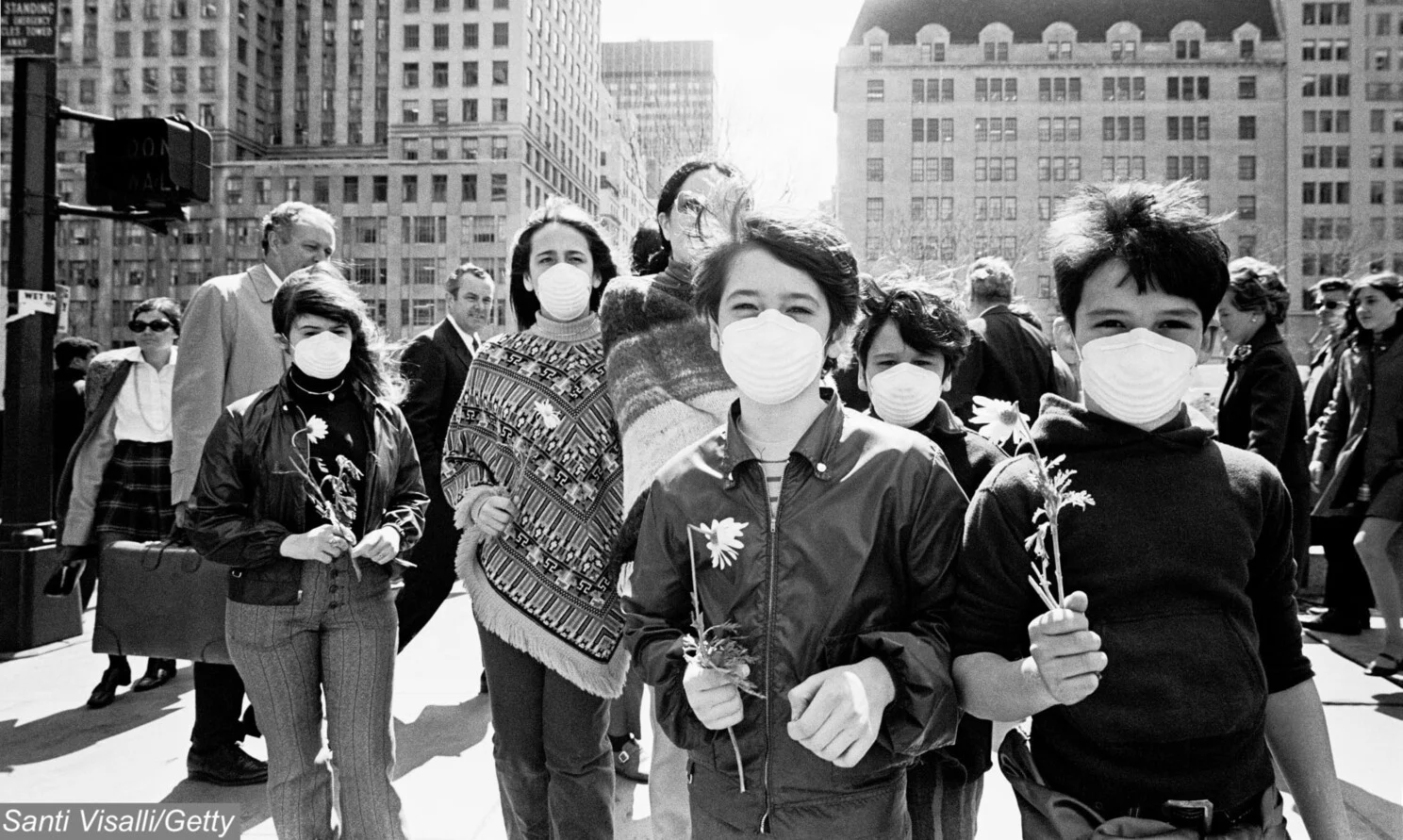 1970, Earth day activists wearing masks to highlight pollution