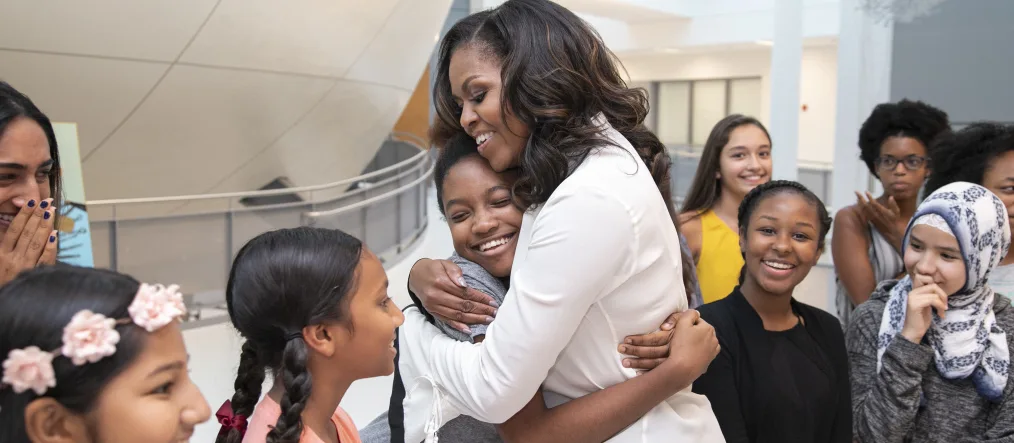 Mrs. Obama greets young girls who helped launch the Girls Opportunity Alliance.