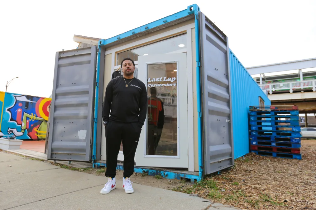 Ian Gonzalez in front of his running store at Boxville Marketplace.