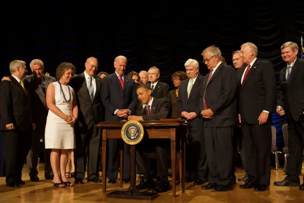 President Barack Obama, with Vice President Joe Biden, delivers remarks and signs the Dodd-Frank Wall Street Reform and Consumer Protection Act