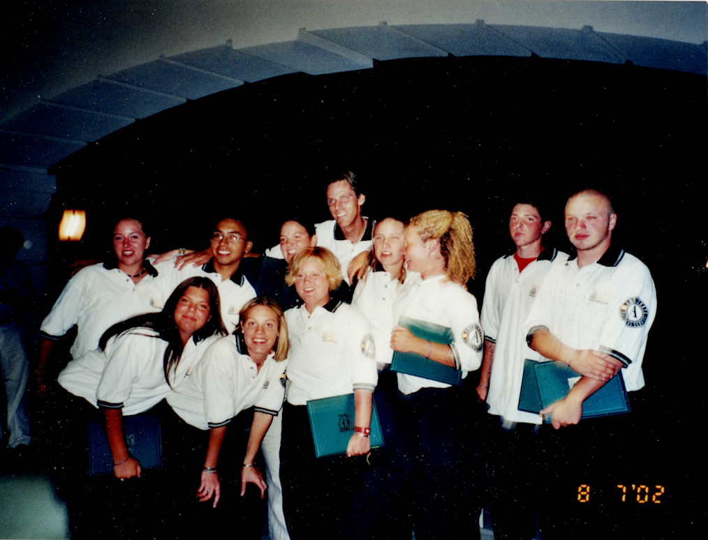 Jerad Morey poses for a photo with his AmeriCorps cohort at a graduation ceremony at McClellan Airforce Base in Sacramento, CA, August 7 of 2002. 