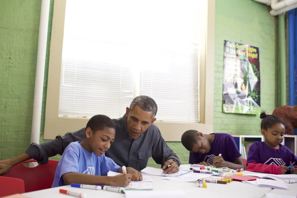 President Barack Obama prepares and assembles literacy kits during a Martin Luther King, Jr. Day of Service event at the Boys and Girls Club of Greater Washington, in Washington, D.C., Jan. 19, 2015.  (Official White House Photo by Pete Souza)