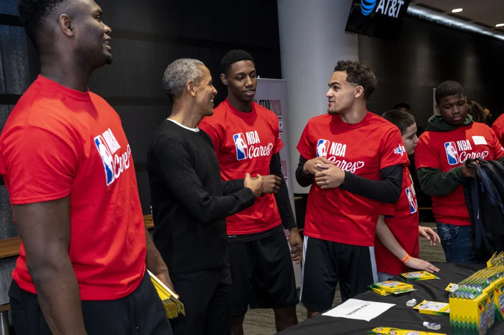 President Obama chats with players at the NBA Cares All-Star Day of Service