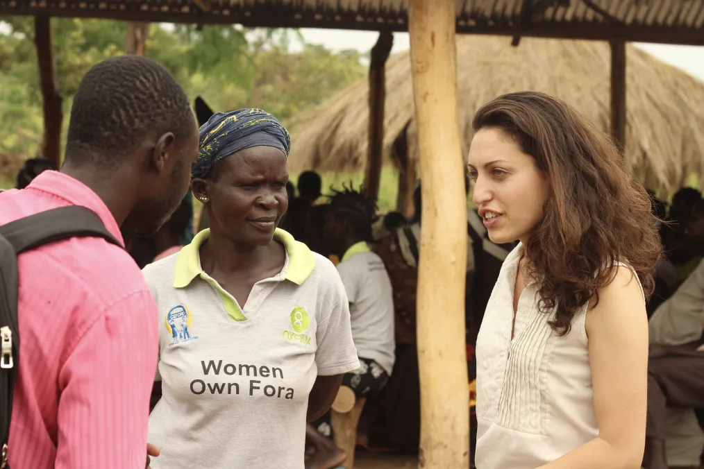 Sasha speaks with refugees at Omugo refugee settlement in Western Uganda.
