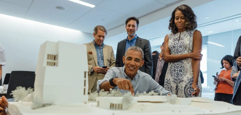 President Obama and Mrs. Obama look at the model of the Obama Presidential Center.