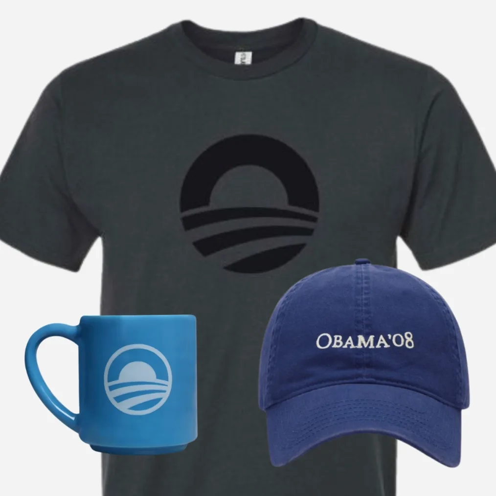 A dark gray tshirt with a black Obama Foundation "sunrise" logo, overlayed with a medium-blue clay mug with the sunrise logo and a dark blue baseball cap with the words "Obama '08"
