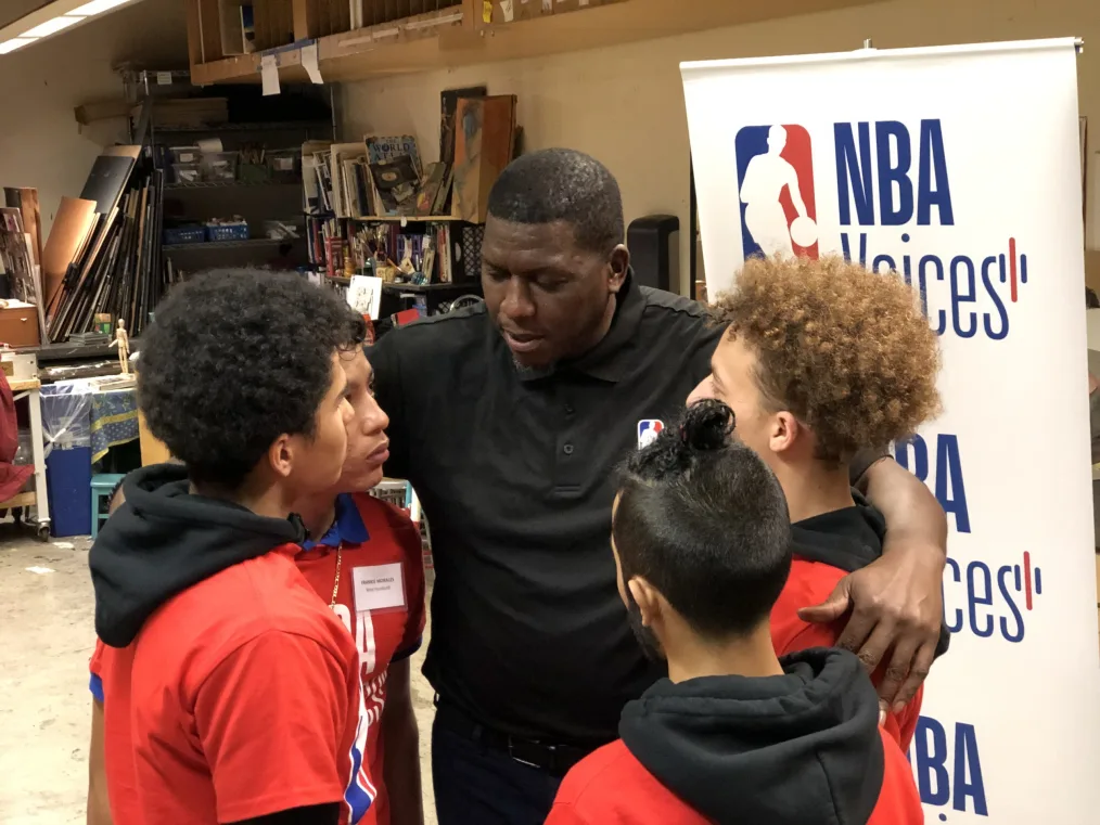 NBA Legend Felipe Lopez encourages young people after participating in a Youth Guidance “Becoming A Man” Circle. 