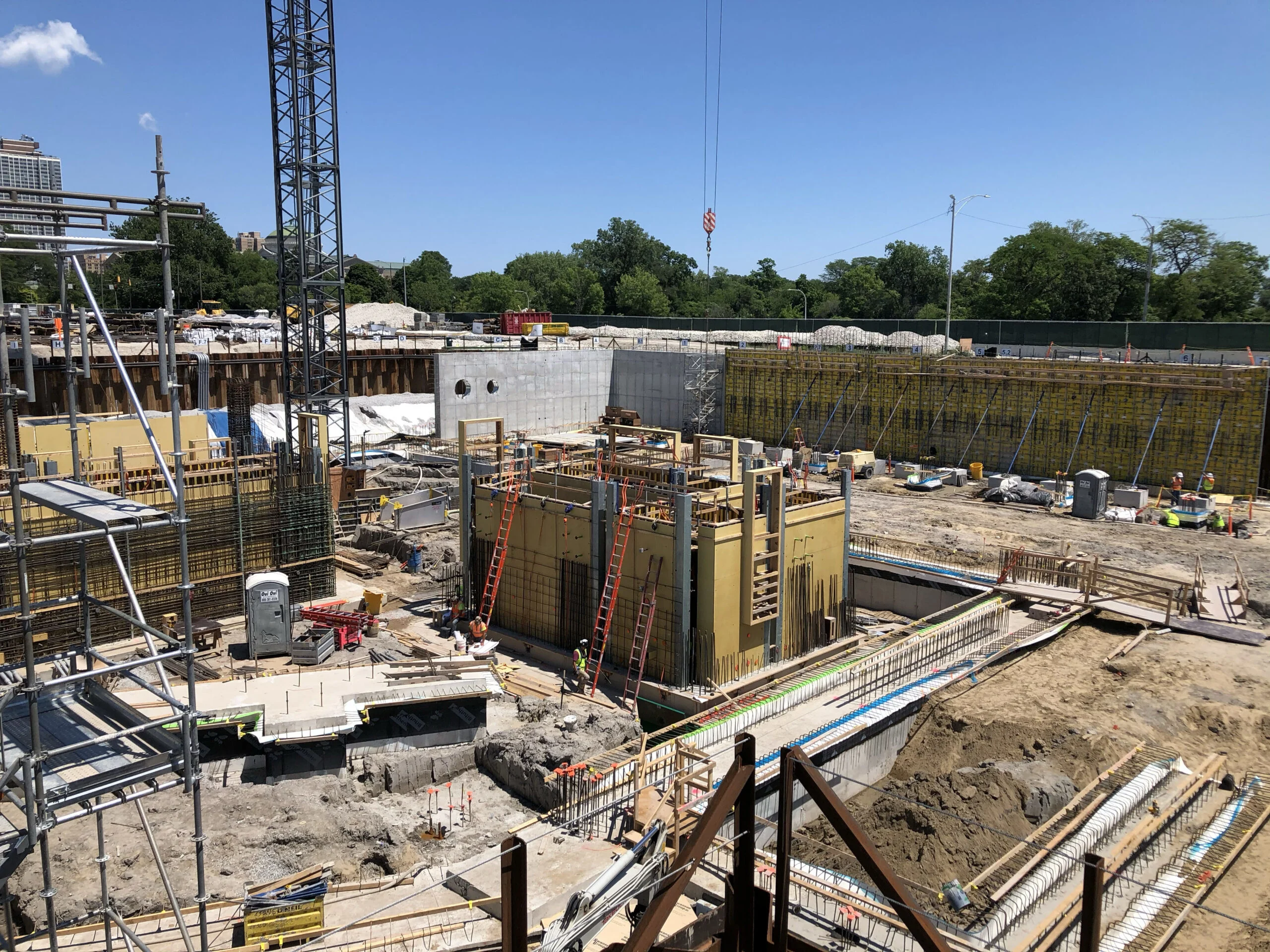 A construction site showing scaffolding and rebar