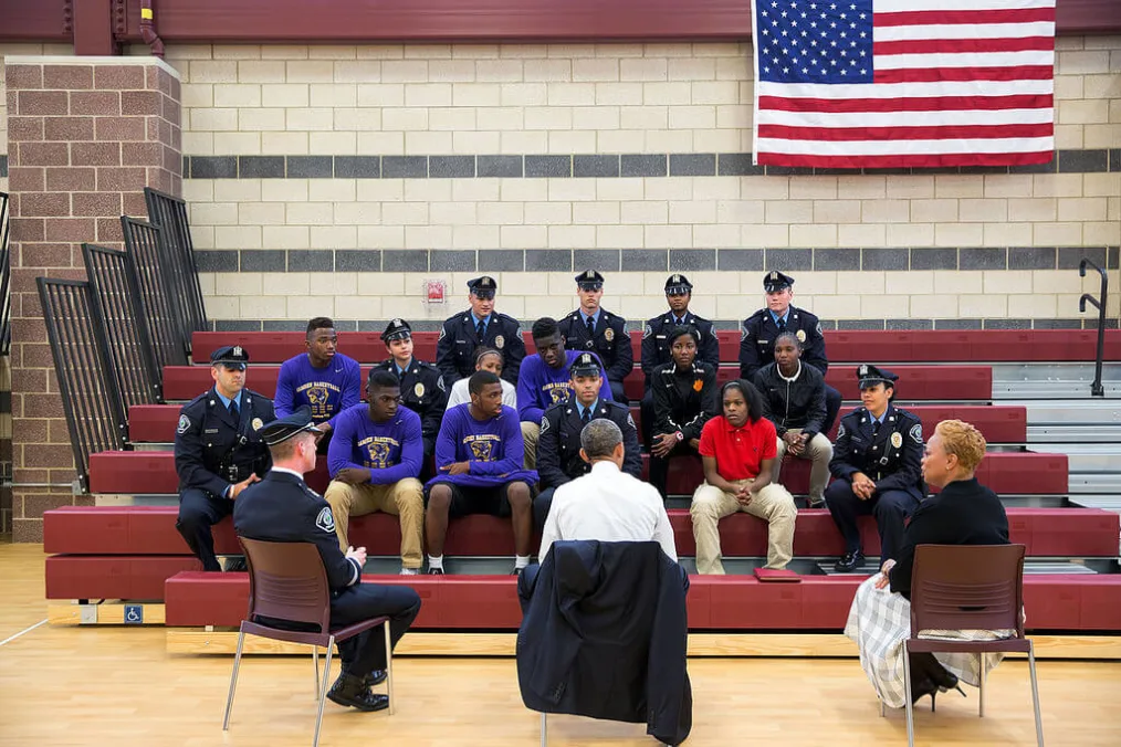 The President talks with students and law enforcement officials about community relations and programs that build trust between youth and the police.