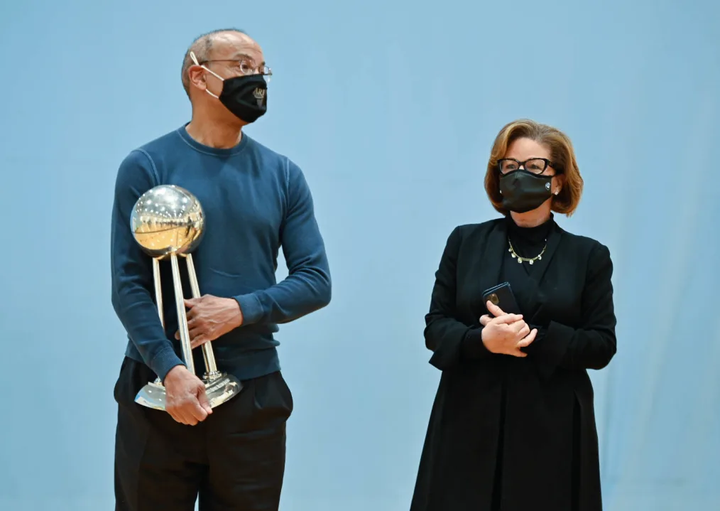 Valerie Jarrett and John Rogers join President Obama at a community event at the South Side YMCA in Chicago, IL on December 2, 2021.