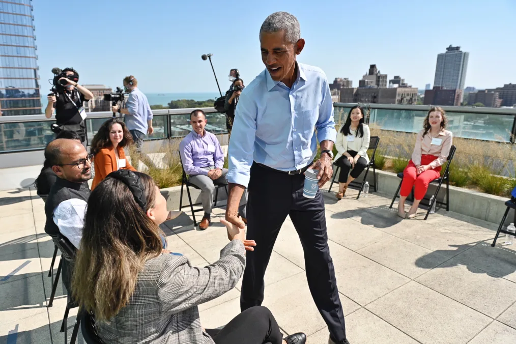 President Obama shakes the hand of an Obama Foundation Scholar