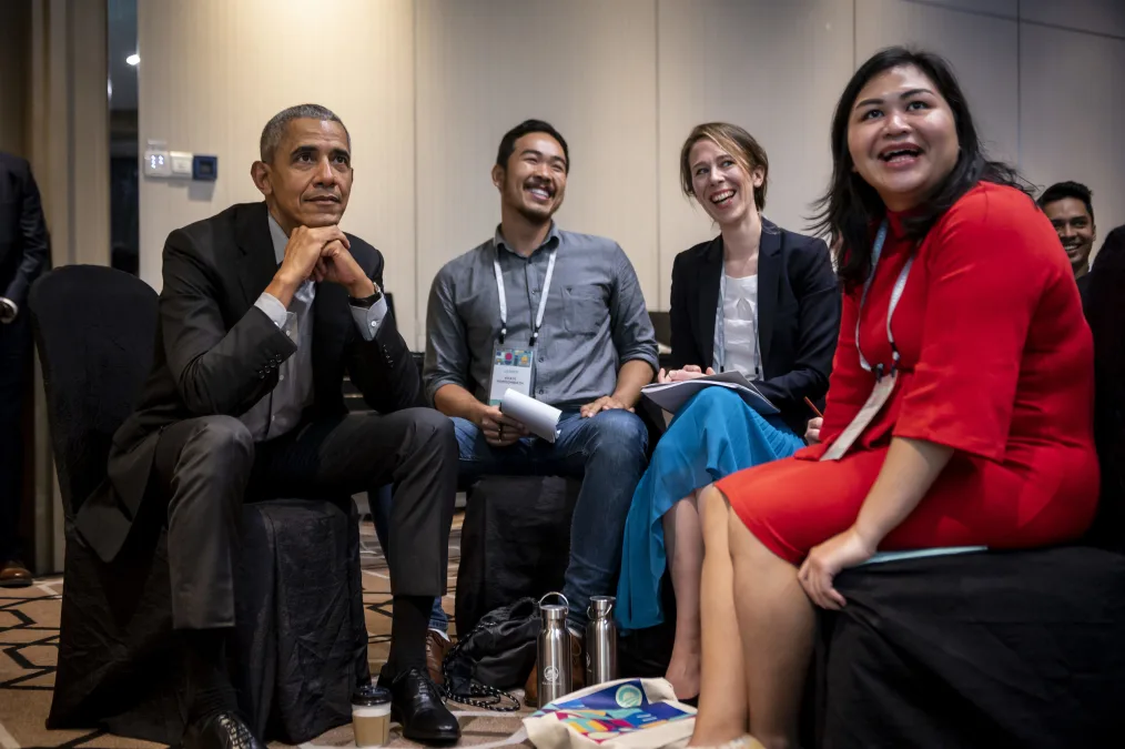 President Obama sits with young leaders.