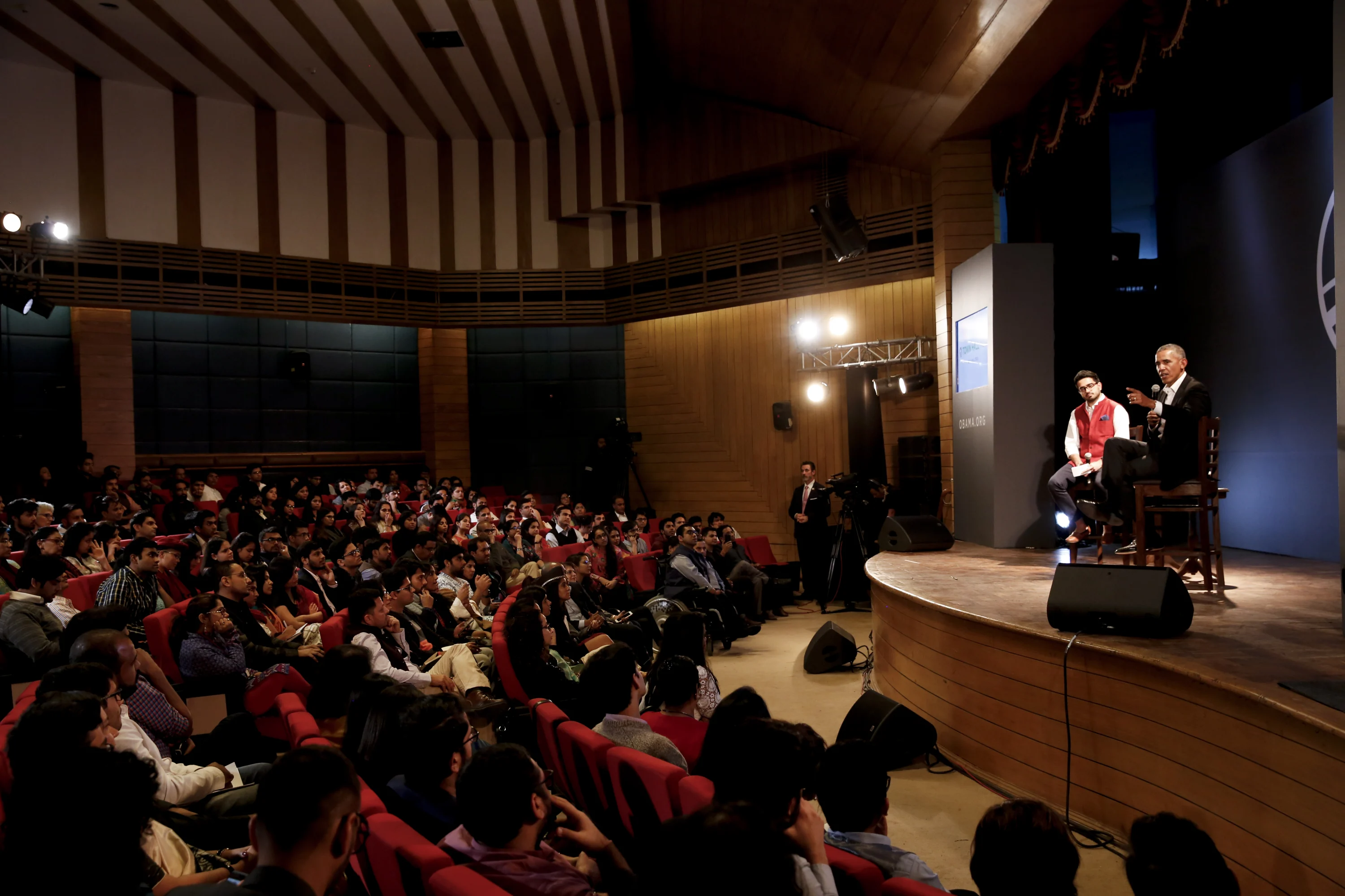 Anshul Tewari founded Youth Ki Awaaz on stage with President Obama during the Obama Foundation's Town Hall in New Delhi, India with President Barack Obama and hundreds of young Indian leaders from across the country in New Delhi, India on Friday, December 