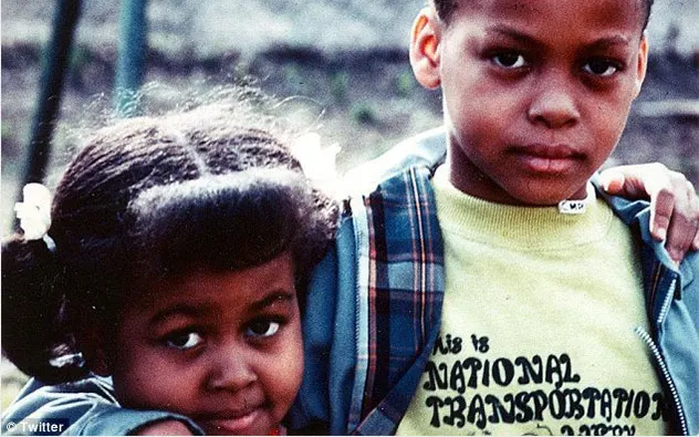 A young Michelle Obama (née Robinson) with her brother Craig