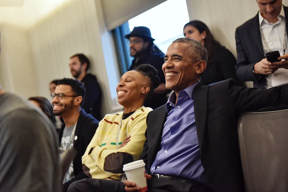 President Obama observes a session at the Obama Foundation Summit.