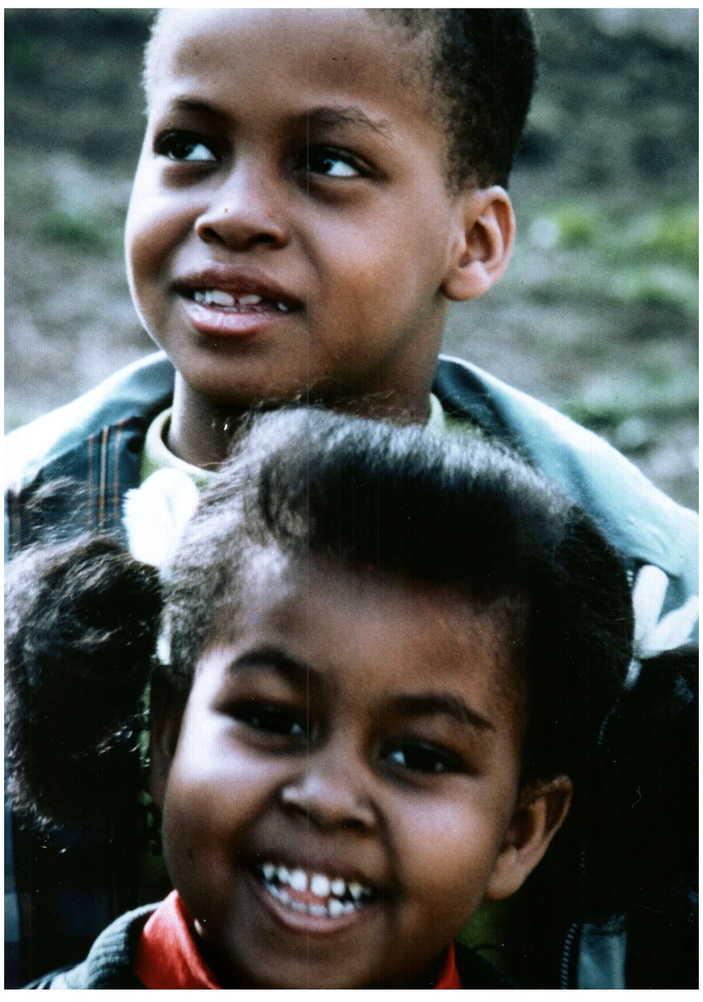 A portrait of Craig and Michelle Robinson when they were kids.