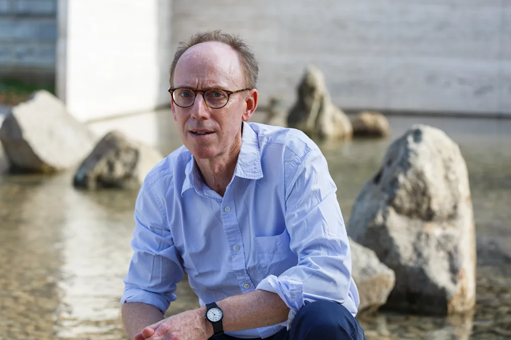 Spencer Finch is crouching down staring off into the distance. Behind him is a body of water with several large rocks sitting in the water. Spencer Finch has pale skin and short light colored hair. He is wearing round glasses that are a dark color. He is wearing a blue button-down shirt, dark pants, and a black watch.​​​​‌﻿‍﻿​‍​‍‌‍﻿﻿‌﻿​‍‌‍‍‌‌‍‌﻿‌‍‍‌‌‍﻿‍​‍​‍​﻿‍‍​‍​‍‌‍​﻿‌‍﻿﻿‌‍﻿‍‌﻿‌​‌‍‌‌‌‍﻿‍‌﻿‌​‌‍‌‍‌﻿‌‌‌‍﻿​​‍﻿‍‌‍​﻿‌‍﻿﻿‌‍﻿‌​‍​‍​‍﻿​​‍​‍‌‍‍​‌﻿​‍‌‍‌‌‌‍‌‍​‍​‍​﻿‍‍​‍​‍‌‍‍​‌﻿‌​‌﻿‌​‌﻿​​‌﻿​﻿​﻿‍‍​‍﻿﻿​‍﻿﻿‌‍​‌‌﻿​​‌﻿​​​‍﻿‍‌‍​﻿‌‍﻿﻿‌‍﻿‍‌﻿‌​‌‍‌‌‌‍﻿‍‌﻿‌​‌‍‌‍‌﻿‌‌‌‍﻿​​‍﻿‍‌‍​﻿‌‍﻿﻿‌‍﻿‌​‍﻿﻿‌﻿​﻿‌﻿​​‌‍​‌‌‍​﻿‌‍‌‌‌﻿​﻿​‍﻿﻿‌‍﻿​​﻿‌﻿‌‍‍​​﻿‌‌​﻿‍‌‌‍‍​‌‍‌‍‌‍﻿‍‌‍﻿​‌﻿‍​‌‍‍‍‌﻿‍​​‍﻿﻿‌‍‌‌‌‍﻿‍‌﻿‌‍‌‍‍‌‌﻿​‍‌‍﻿﻿‌‍﻿‍‌‍﻿‌‌‍‌‌‌‍﻿‍‌﻿‌​‌﻿​﻿​‍﻿﻿‌‍﻿‌‌‍​‌‌﻿​﻿‌﻿‌​‌‍‌‌‌﻿​‍​‍﻿﻿‌‍‌‌‌‍﻿‍‌﻿‌​‌﻿​‍‌‍‍‌‌‍‌‌‌﻿​﻿​‍﻿﻿​﻿​‍‌﻿‌﻿‌‍‌﻿‌​​﻿​﻿​​‌‌‌​‌‍‌​‌‍﻿﻿‌​﻿﻿‌‍‌​‌‌‌﻿‌‍‌﻿‌﻿‍​‌​‌‌​﻿‌﻿‌‍‍‍‌‌​​‌​﻿﻿​﻿​‍‌﻿‍​‌﻿​‍​‍﻿﻿​﻿﻿﻿‌‍‌‍‌‍﻿﻿‌‍​﻿‌﻿‌‌‌﻿​﻿‌‍‌‌‌‍‌​‌​‌‍‌‍‍‌‌‍‌‌‌‍﻿​‌‍‌​​﻿﻿‌‌‍​‌‌‍﻿​‌﻿‌​‌‌‌​‌‍‌‌‌﻿‍​‌﻿‌​​‍‌‍‌‍‌‍‌‍﻿﻿‌‍​﻿‌﻿‌‌‌﻿​﻿‌‍‌‌‌‍‌​‌​﻿​‌‍﻿﻿‌‍​﻿‌‍​‌‌‍﻿​‌‍‌‌​﻿﻿‌‌‍‌‌‌‍﻿‍​‍﻿‌‌‌‌‌‌‌​﻿​‍‌‍‌﻿​﻿‌‍﻿﻿‌﻿‌‌‌﻿​‍‌‍​﻿‌‍‌‌​﻿﻿‌‌﻿‌‍‌‍‌‌‌﻿​‍‌‍​﻿‌‍‌‌‌‍﻿​​‍﻿‌‌‍​﻿‌‍﻿﻿‌‍﻿‍‌﻿‌​‌‍‌‌‌‍﻿‍‌﻿‌​​‍﻿‌‌‍﻿​‌‍‍‌‌‍﻿‍‌‍‍﻿​‍​‍​‍﻿​​‍​‍‌‍​﻿‌‍﻿﻿‌‍﻿‍‌﻿‌​‌‍‌‌‌‍﻿‍‌﻿‌​‌‍‌‍‌﻿‌‌‌‍﻿​​‍​‍​﻿‍‍‌﻿‍﻿​‍​‍‌‍‌‌‌‍‌​‌‍‍‌‌﻿‌​‌‍﻿﻿‌﻿​‍‌​‍‌‌‍﻿‍‌﻿‌​‌‍‌‌‌﻿​‍‌‍‌‍‌‍​‌‌‍​﻿‌‍‌‌​‍​‍​﻿‍‍‌﻿‍﻿​‍​‍‌﻿‌﻿‌‍‍‌‌‍‌​‌‍‌﻿‌‍‌‌‌﻿‌​‌​‍‌‌‍‌​​‍​‍​﻿‍‍​‍​‍‌‍﻿‌‌﻿‌‌‌‍﻿​‌﻿‌​‌‍‍‌‌﻿​​‌‍﻿​‌‍‌‌‌​﻿​‌‍‍‌‌‍﻿‍‌‍‌‌​‍​‍​‍﻿​​‍​‍‌﻿‌﻿‌‍‍‌‌‍‌​‌‍‌﻿‌‍‌‌‌﻿‌​‌​﻿‍‌‍​‌‌‍﻿‌‌‍‌‌‌﻿​﻿‌﻿​​‌‍​‌‌‍​﻿‌‍‌‌​‍​‍​﻿‍‍​‍​‍‌‍​‍‌﻿‌‌‌‍‍‌‌‍﻿​‌﻿‌​‌‍‍‌‌‍﻿‍​‍​‍‌﻿﻿‌​‍﻿​​‍​‍‌‍‌‍‌‍‍‌‌‍‌‌‌‍﻿​‌‍‌​‌‌‌​‌﻿‍‌‌﻿​​‌‍‌‌​‍​‍​﻿‍‍​‍​‍‌‌‌​‌‍‌‌‌﻿‍​‌﻿‌​​‍​‍‌﻿﻿‌‌﻿﻿‌