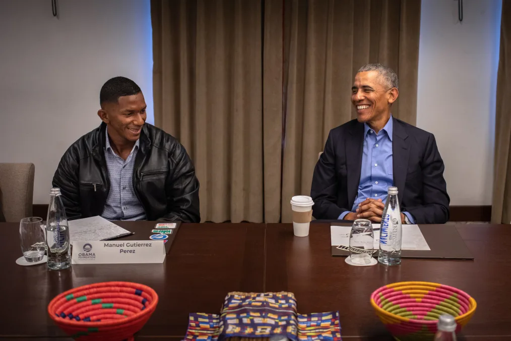 President Obama smiles while looking at Leader Manuel Gutierrez Perez.