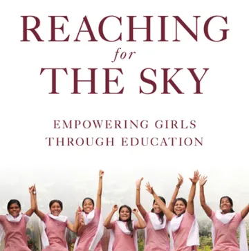 A cover which title reads "REACHING FOR THE SKY, Empowering young girls through education." At the bottom is a row of women with medium skin with warm undertones, white fabric hung loose around there next draping down there backs, and pink dresses, raise there hands to the sky.