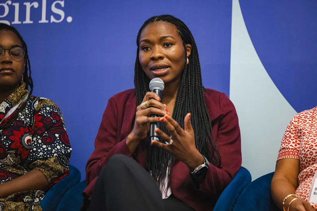 A woman with braids and a dark skin tone speaks into a mic while gesturing. She wears a maroon jacket and black slacks. ​​​​‌﻿‍﻿​‍​‍‌‍﻿﻿‌﻿​‍‌‍‍‌‌‍‌﻿‌‍‍‌‌‍﻿‍​‍​‍​﻿‍‍​‍​‍‌‍​﻿‌‍﻿﻿‌‍﻿‍‌﻿‌​‌‍‌‌‌‍﻿‍‌﻿‌​‌‍‌‍‌﻿‌‌‌‍﻿​​‍﻿‍‌‍​﻿‌‍﻿﻿‌‍﻿‌​‍​‍​‍﻿​​‍​‍‌‍‍​‌﻿​‍‌‍‌‌‌‍‌‍​‍​‍​﻿‍‍​‍​‍‌‍‍​‌﻿‌​‌﻿‌​‌﻿​​‌﻿​﻿​﻿‍‍​‍﻿﻿​‍﻿﻿‌‍​‌‌﻿​​‌﻿​​​‍﻿‍‌‍​﻿‌‍﻿﻿‌‍﻿‍‌﻿‌​‌‍‌‌‌‍﻿‍‌﻿‌​‌‍‌‍‌﻿‌‌‌‍﻿​​‍﻿‍‌‍​﻿‌‍﻿﻿‌‍﻿‌​‍﻿﻿‌﻿​﻿‌﻿​​‌‍​‌‌‍​﻿‌‍‌‌‌﻿​﻿​‍﻿﻿‌‍﻿​​﻿‌﻿‌‍‍​​﻿‌‌​﻿‍‌‌‍‍​‌‍‌‍‌‍﻿‍‌‍﻿​‌﻿‍​‌‍‍‍‌﻿‍​​‍﻿﻿‌‍‌‌‌‍﻿‍‌﻿‌‍‌‍‍‌‌﻿​‍‌‍﻿﻿‌‍﻿‍‌‍﻿‌‌‍‌‌‌‍﻿‍‌﻿‌​‌﻿​﻿​‍﻿﻿‌‍﻿‌‌‍​‌‌﻿​﻿‌﻿‌​‌‍‌‌‌﻿​‍​‍﻿﻿‌‍‌‌‌‍﻿‍‌﻿‌​‌﻿​‍‌‍‍‌‌‍‌‌‌﻿​﻿​‍﻿﻿​﻿‌‌‌‌‍‌‌‌‌​‌﻿​﻿‌​﻿﻿‌‌‌﻿‌‍‌‌‌‌‍‍‌‌​‌‌﻿​​‌﻿‍​‌‍‍‍‌​​‌​﻿‌​‌​‍﻿‌‍﻿​‌​﻿‍‌﻿​‍‌‍﻿‍‌‍﻿‌‌​​‌​﻿​﻿​‍﻿﻿​﻿﻿﻿‌‍‌‍‌‍﻿﻿‌‍​﻿‌﻿‌‌‌﻿​﻿‌‍‌‌‌‍‌​‌​‌‍‌‍‍‌‌‍‌‌‌‍﻿​‌‍‌​​﻿﻿‌‌‍​‌‌‍﻿​‌﻿‌​‌‌‌​‌‍‌‌‌﻿‍​‌﻿‌​​‍‌‍‌‍‌‍‌‍﻿﻿‌‍​﻿‌﻿‌‌‌﻿​﻿‌‍‌‌‌‍‌​‌​﻿​‌‍﻿﻿‌‍​﻿‌‍​‌‌‍﻿​‌‍‌‌​﻿﻿‌‌‍‌‌‌‍﻿‍​‍﻿‌‌‌‌‌‌‌​﻿​‍‌‍‌﻿​﻿‌‍﻿﻿‌﻿‌‌‌﻿​‍‌‍​﻿‌‍‌‌​﻿﻿‌‌﻿‌‍‌‍‌‌‌﻿​‍‌‍​﻿‌‍‌‌‌‍﻿​​‍﻿‌‌‍​﻿‌‍﻿﻿‌‍﻿‍‌﻿‌​‌‍‌‌‌‍﻿‍‌﻿‌​​‍﻿‌‌‍﻿​‌‍‍‌‌‍﻿‍‌‍‍﻿​‍​‍​‍﻿​​‍​‍‌‍​﻿‌‍﻿﻿‌‍﻿‍‌﻿‌​‌‍‌‌‌‍﻿‍‌﻿‌​‌‍‌‍‌﻿‌‌‌‍﻿​​‍​‍​﻿‍‍‌﻿‍﻿​‍​‍‌‍‌‌‌‍‌​‌‍‍‌‌﻿‌​‌‍﻿﻿‌﻿​‍‌​‍‌‌‍﻿‍‌﻿‌​‌‍‌‌‌﻿​‍‌‍‌‍‌‍​‌‌‍​﻿‌‍‌‌​‍​‍​﻿‍‍‌﻿‍﻿​‍​‍‌﻿‌﻿‌‍‍‌‌‍‌​‌‍‌﻿‌‍‌‌‌﻿‌​‌​‍‌‌‍‌​​‍​‍​﻿‍‍​‍​‍‌‍﻿‌‌﻿‌‌‌‍﻿​‌﻿‌​‌‍‍‌‌﻿​​‌‍﻿​‌‍‌‌‌​﻿​‌‍‍‌‌‍﻿‍‌‍‌‌​‍​‍​‍﻿​​‍​‍‌﻿‌﻿‌‍‍‌‌‍‌​‌‍‌﻿‌‍‌‌‌﻿‌​‌​﻿‍‌‍​‌‌‍﻿‌‌‍‌‌‌﻿​﻿‌﻿​​‌‍​‌‌‍​﻿‌‍‌‌​‍​‍​﻿‍‍​‍​‍‌‍​‍‌﻿‌‌‌‍‍‌‌‍﻿​‌﻿‌​‌‍‍‌‌‍﻿‍​‍​‍‌﻿﻿‌​‍﻿​​‍​‍‌‍‌‍‌‍‍‌‌‍‌‌‌‍﻿​‌‍‌​‌‌‌​‌﻿‍‌‌﻿​​‌‍‌‌​‍​‍​﻿‍‍​‍​‍‌‌‌​‌‍‌‌‌﻿‍​‌﻿‌​​‍​‍‌﻿﻿‌‌﻿﻿‌