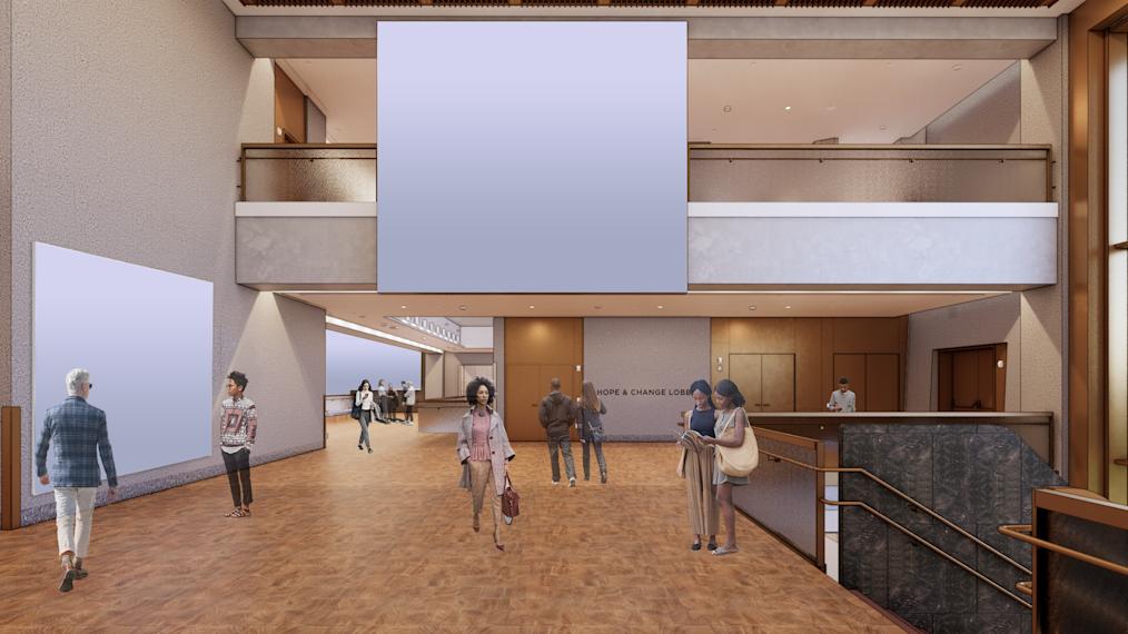 A digital rendering of the Hope and Change Lobby at the Obama Presidential Center with stairs and a balcony. Blank spaces are on the walls to represent where artwork will hang.