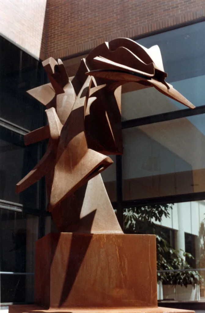 Richard Hunt's "Farmer's Dream" abstract sculpture shown in brownish bronze.