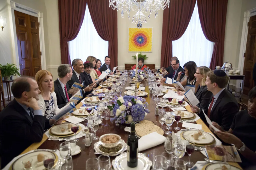 President Barack Obama and First Lady Michelle Obama host a Passover Seder dinner in the Old Family Dining Room of the White House, April 3, 2015.
