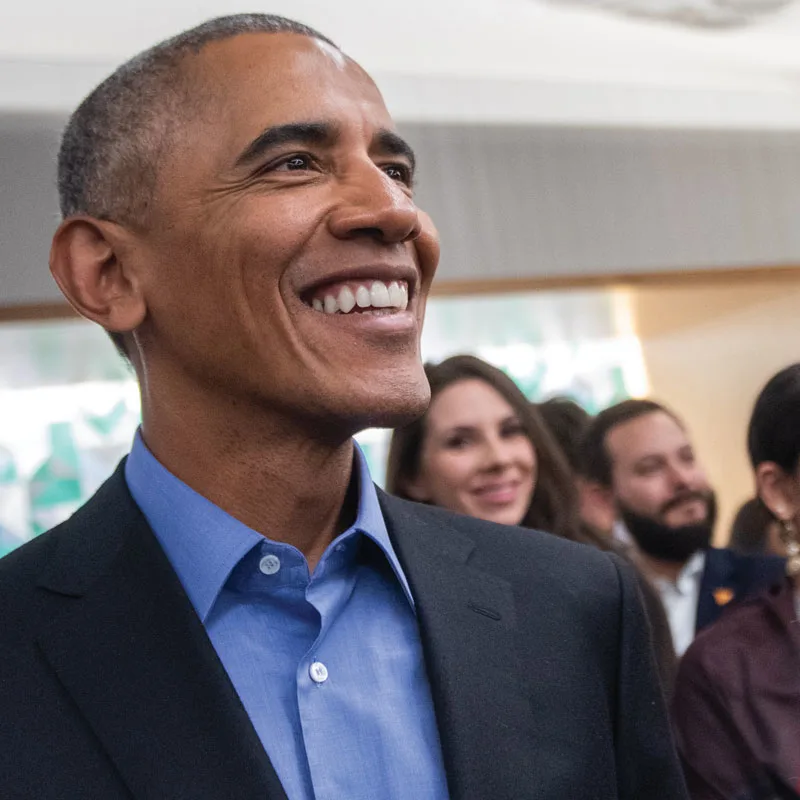 President Obama smiles at participants during a breakout session at the Obama Foundation Summit.