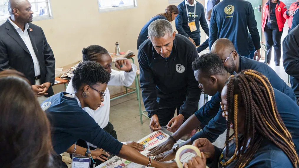President Obama works with members of the first Leaders: Africa class at a service project in Johannesburg.