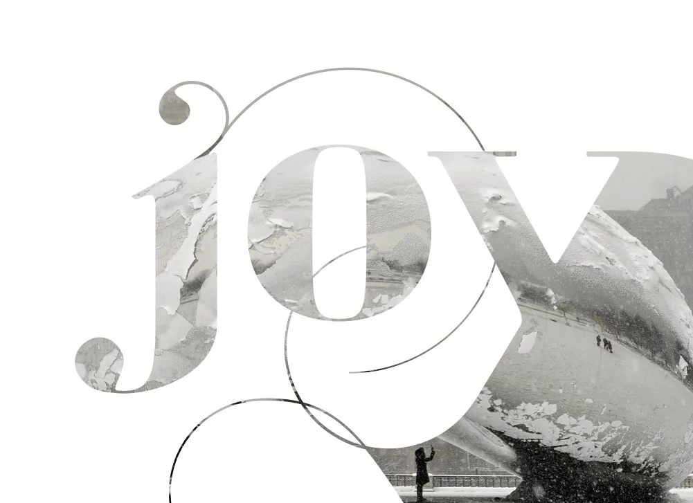 A image of a white background and the word "joy." The Chicago bean monumement in the winter is the background.