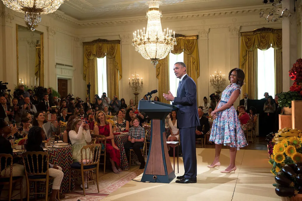President Barack Obama and First Lady Michelle Obama onstage during an event.