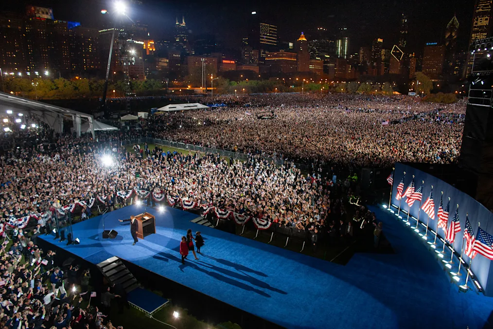 Democratic candidate Sen. Barack Obama (D-IL) comes out to greet the crowd, along with his wife, Michelle and children Malia, 10, and Sasha 7, at his Election Night Rally in Grant Park, Chicago, Illinois, November 4, 2008.