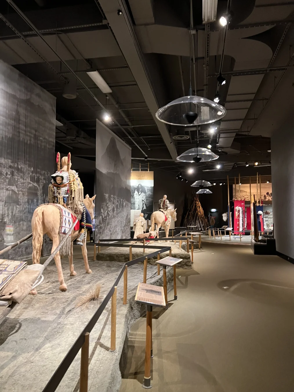 Inside an exhibit at the Plains Indian Museum in Cody, Wyoming. Indian artifacts, in addition to faux horse stations, can be seen in this exhibit space.