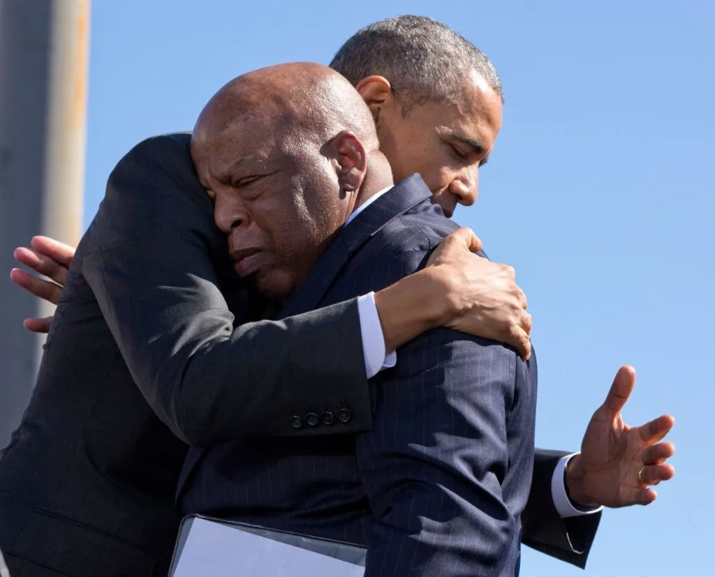 President Obama and Congressman John Lewis hug