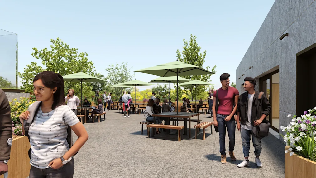 A digital rendering of a concrete courtyard with picnic tables and umbrellas, bordered by foliage.
