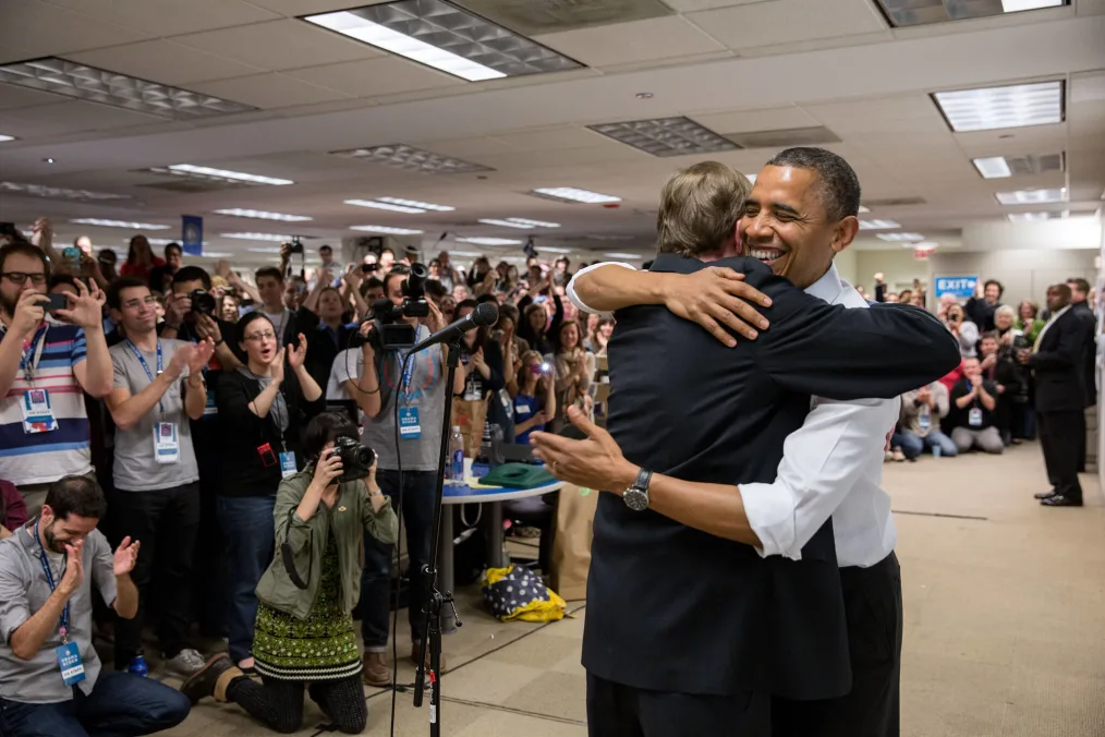 President Barack Obama hugs his campaign manager, Jim Messina.