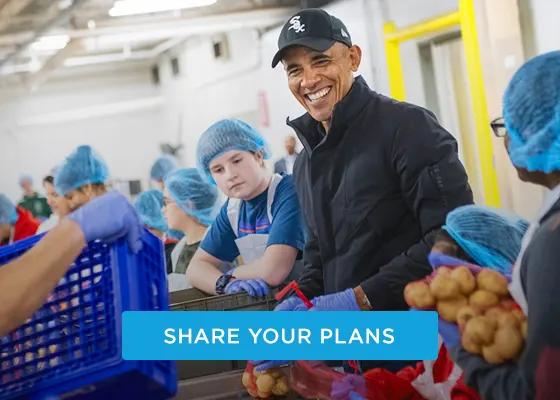 President Obama smiles while helping in a factory with a group of workers of various skin tones with packaging potatoes, with text at the bottom that says "SHARE YOUR PLANS." 