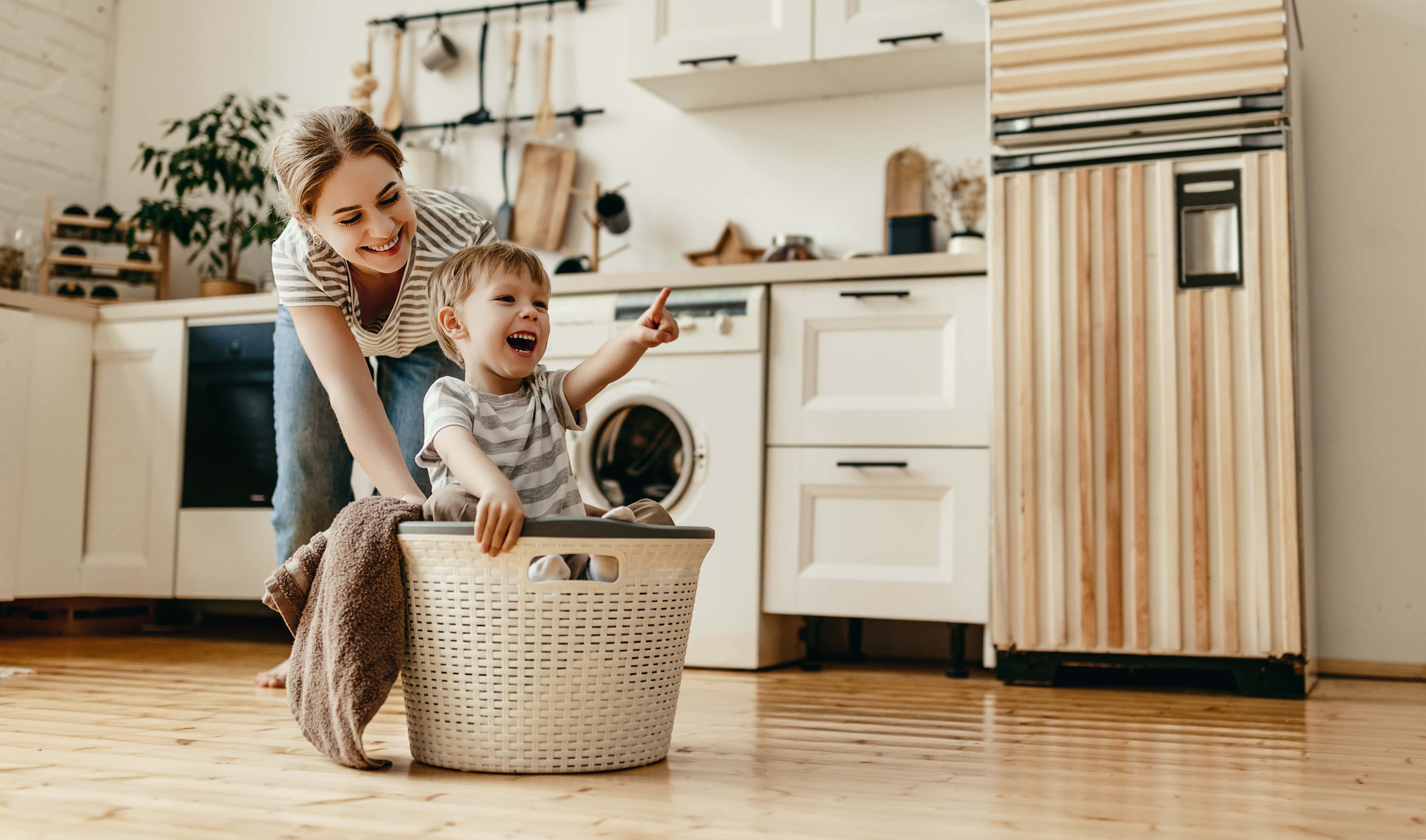 woman pushing child in basket