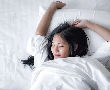 Woman waking up in the morning