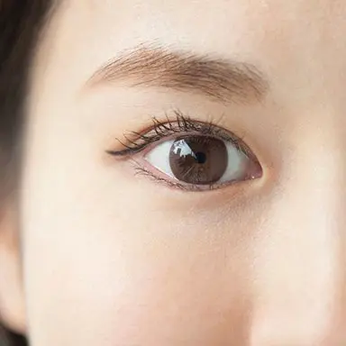 Woman having dewy soft facial skin thanks to ceramides