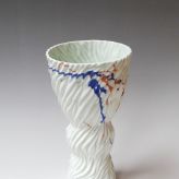15-1-Flow-vase-small-275x15cm-porcelain-pigment-glaze-casted-blue-orange-TerraDelft