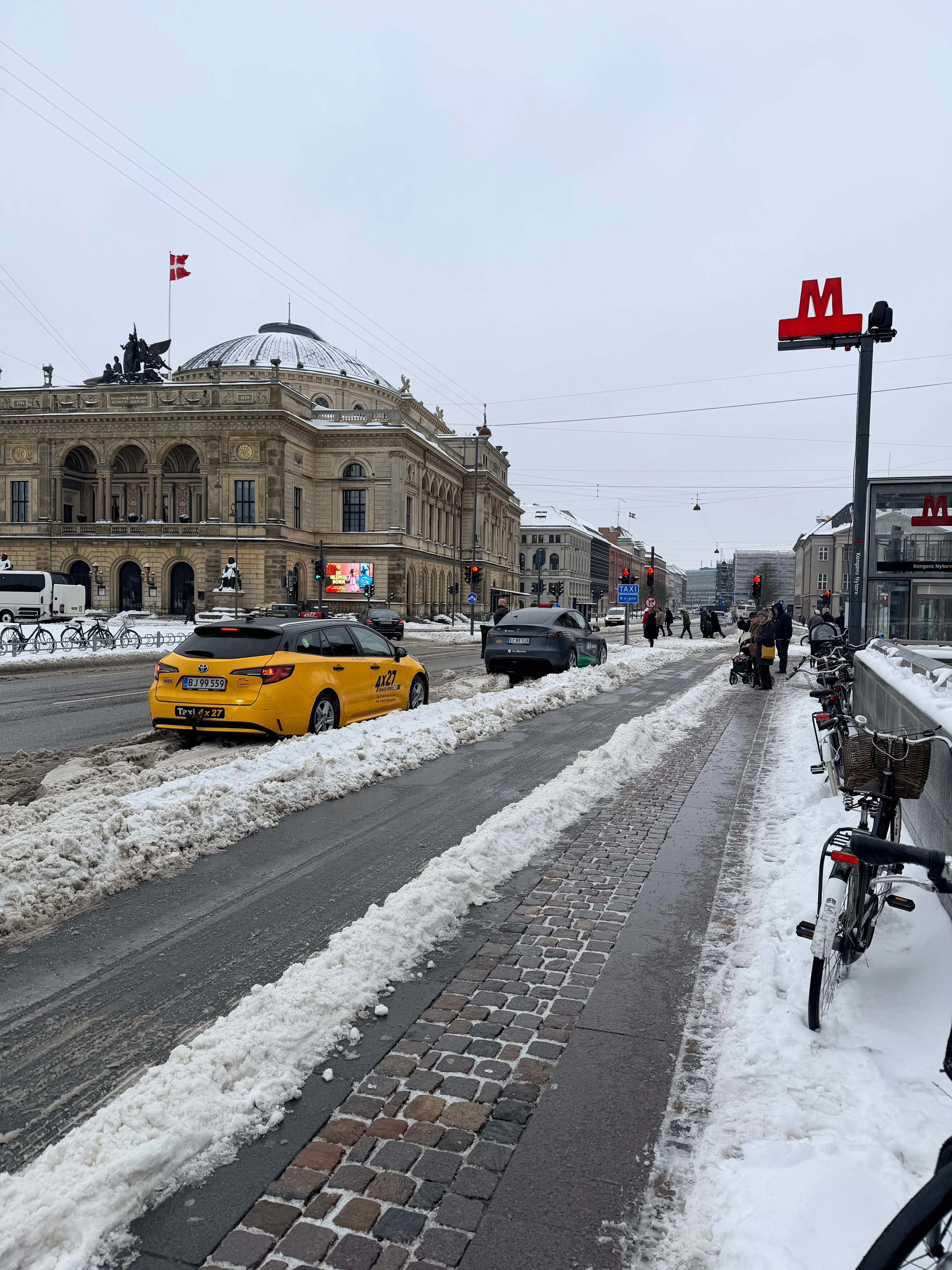 Snow-covered streets and buildings upon arrival in Copenhagen.