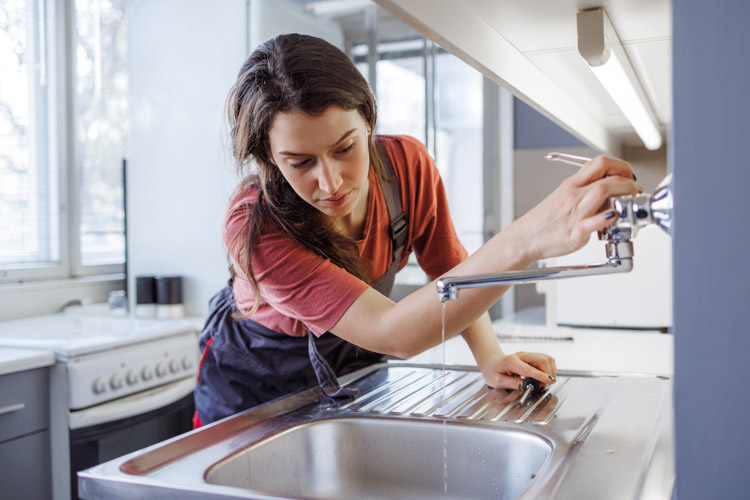 Woman at sink