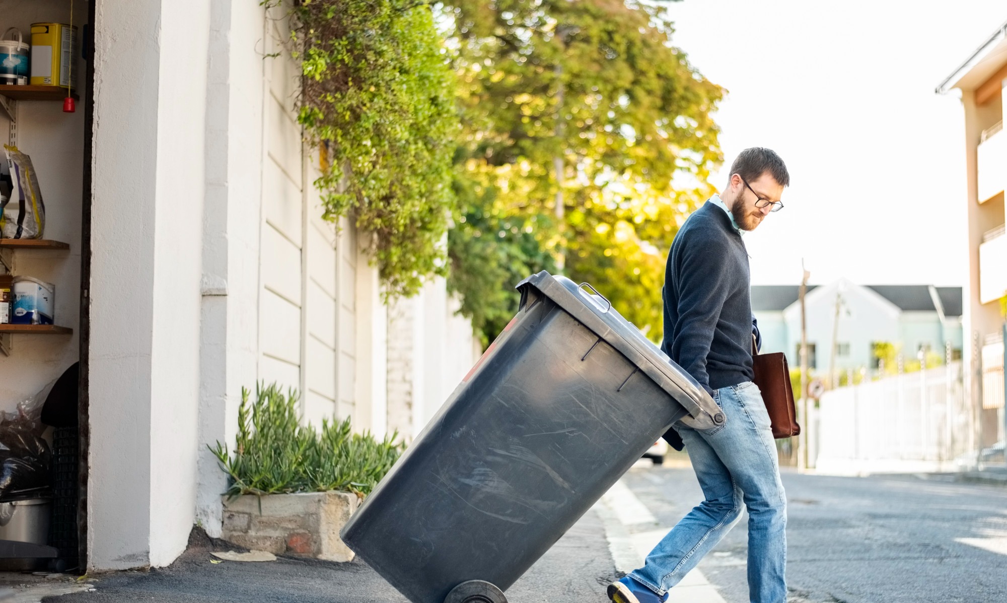 man taking out trash