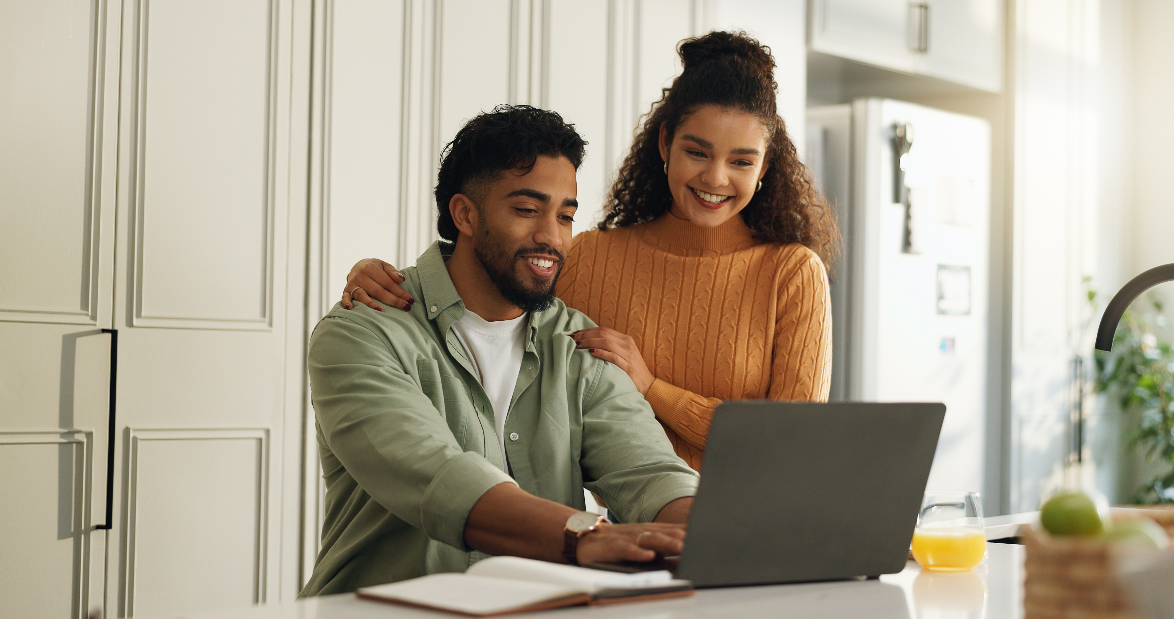 Man and woman on a computer