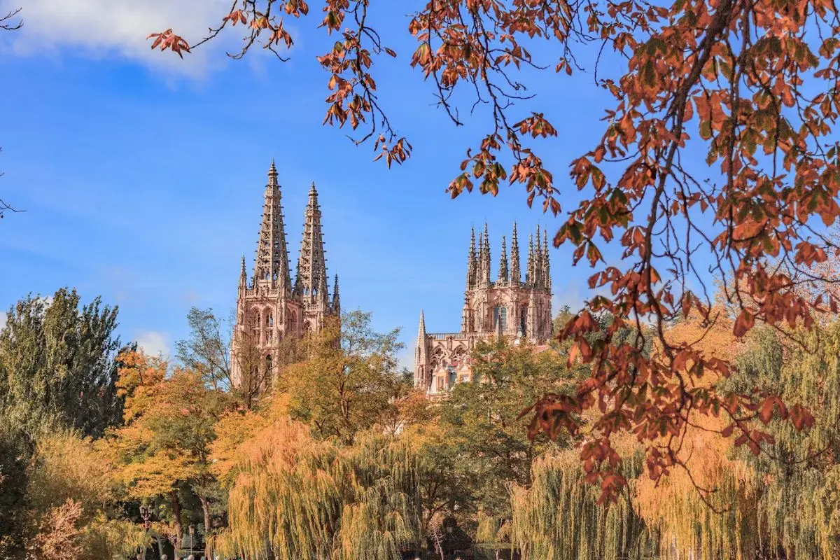 Park Güell in Barcelona with autumn leaves and iconic architecture, an exciting European fall destination.