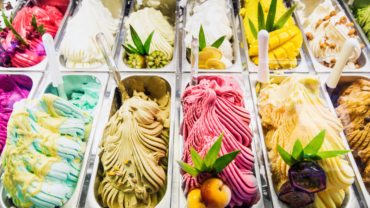 https:National Ice Cream Day! Indulge in a frozen treat showdown - creamy gelato or classic ice cream? Discover the delicious differences and find the perfect summer cooler!